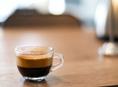 selective focus photography of a cup of black coffee